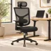 Black mesh ergonomic office chair in a bright home office
