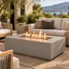 Low propane fire pit table in an outdoor seating area