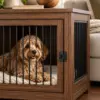 Close view of wooden dog crate door and ventilated side